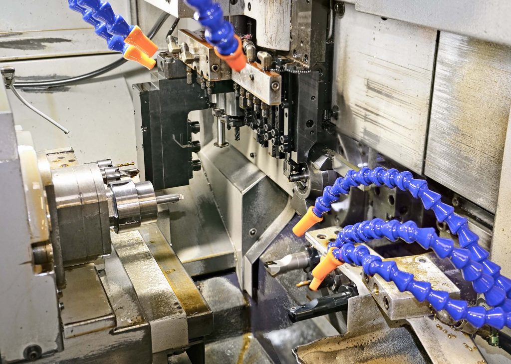 Working area of the Cincom L20, showing the gang tooling and sub spindle on the left opposing the sliding-headstock unit.