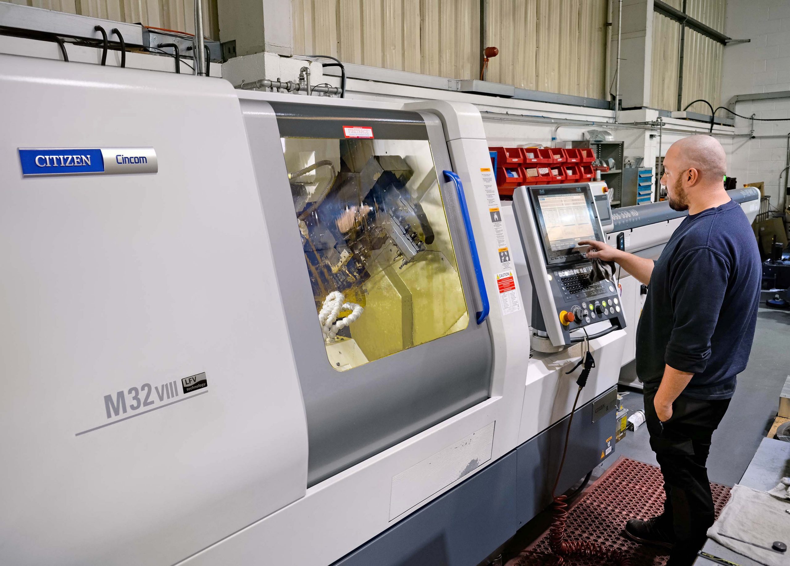 RAPID SET-UPS DECIDE SLIDING-HEAD LATHE PURCHASE